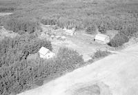 Aerial photograph of a farm in Saskatchewan (52-23-W3)