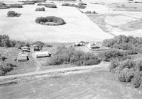Aerial photograph of a farm in Saskatchewan (49-19-W3)