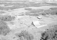 Aerial photograph of a farm in Saskatchewan (10-49-19-W3)