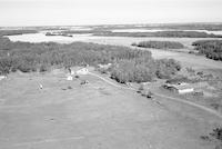 Aerial photograph of a farm in Saskatchewan (16-49-19-W3)