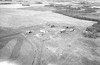 Aerial photograph of a farm in Saskatchewan (49-19-W3)