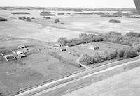 Aerial photograph of a farm in Saskatchewan (26-49-19-W3)