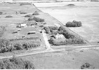 Aerial photograph of a farm in Saskatchewan (25-49-19-W3)