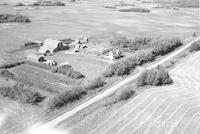 Aerial photograph of a farm in Saskatchewan (49-19-W3)