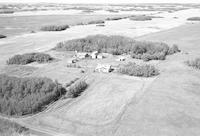 Aerial photograph of a farm in Saskatchewan (49-19-W3)