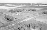 Aerial photograph of a farm in Saskatchewan (49-19-W3)