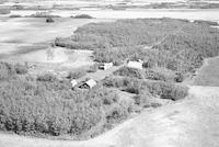 Aerial photograph of a farm in Saskatchewan (49-20-W3)