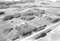 Aerial photograph of a farm near Dulwich, SK (49-20-W3)