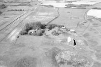 Aerial photograph of a farm near Mervin, SK (49-20-W3)