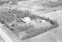 Aerial photograph of a farm in Saskatchewan (49-23-W3)