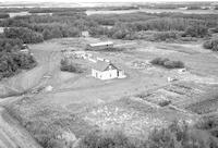 Aerial photograph of a farm in Saskatchewan (49-23-W3)