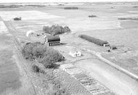 Aerial photograph of a farm in Saskatchewan (49-23-W3)