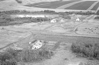 Aerial photograph of a farm in Saskatchewan (49-23-W3)