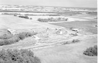 Aerial photograph of a farm in Saskatchewan (49-23-W3)