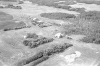 Aerial photograph of a farm in Saskatchewan (20-49-23-W3)