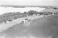 Aerial photograph of a farm in Saskatchewan (49-23-W3)
