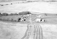 Aerial photograph of a farm in Saskatchewan (30-50-20-W3)