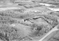 Aerial photograph of a farm near Turtleford, SK (51-20-W3)