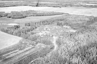 Aerial photograph of a farm in Saskatchewan (51-20-W3)