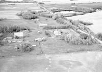 Aerial photograph of a farm in Saskatchewan (51-20-W3)