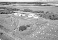 Aerial photograph of a farm in Saskatchewan (51-21-W3)