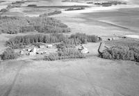 Aerial photograph of a farm in Saskatchewan (51-21-W3)