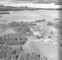 Aerial photograph of a farm in Saskatchewan (51-23-W3)