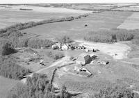 Aerial photograph of a farm in Saskatchewan (51-23-W3)