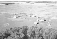 Aerial photograph of a farm in Saskatchewan (51-23-W3)