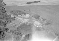 Aerial photograph of a farm in Saskatchewan (51-23-W3)