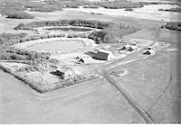 Aerial photograph of a farm in Saskatchewan (51-23-W3)