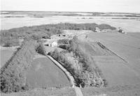 Aerial photograph of a farm in Saskatchewan (51-23-W3)