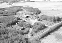 Aerial photograph of a farm in Saskatchewan (51-23-W3)