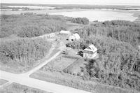 Aerial photograph of a farm in Saskatchewan (51-21-W3)