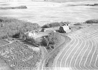 Aerial photograph of a farm in Saskatchewan (52-21-W3)