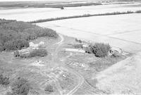 Aerial photograph of a farm near Paradise Hill, SK (52-23-W3)