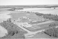 Aerial photograph of a farm near Paradise Hill, SK (52-23-W3)