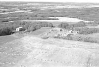 Aerial photograph of a farm near Paradise Hill, SK (52-23-W3)