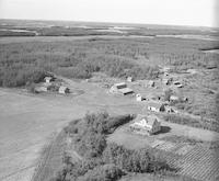 Aerial photograph of a farm near Paradise Hill, SK (52-23-W3)