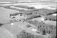 Aerial photograph of a farm near Paradise Hill, SK (52-23-W3)