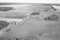 Aerial photograph of a farm in Saskatchewan (52-23-W3)