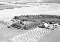 Aerial photograph of a farm in Saskatchewan (52-23-W3)