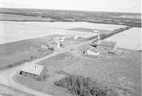 Aerial photograph of a farm in Saskatchewan (52-23-W3)