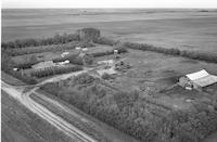 Aerial photograph of a farm in Saskatchewan (36-18-W3)