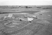 Aerial photograph of a farm in Saskatchewan (31-36-23-W3)