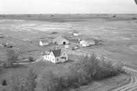 Aerial photograph of a farm in Saskatchewan (31-36-23-W3)