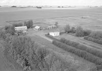 Aerial photograph of a farm in Saskatchewan (10-36-24-W3)