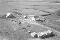 Aerial photograph of a farm in Saskatchewan (37-19-W3)