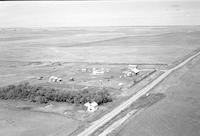 Aerial photograph of a farm in Saskatchewan (37-23-W3)