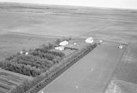 Aerial photograph of a farm in Saskatchewan (23-37-24-W3)